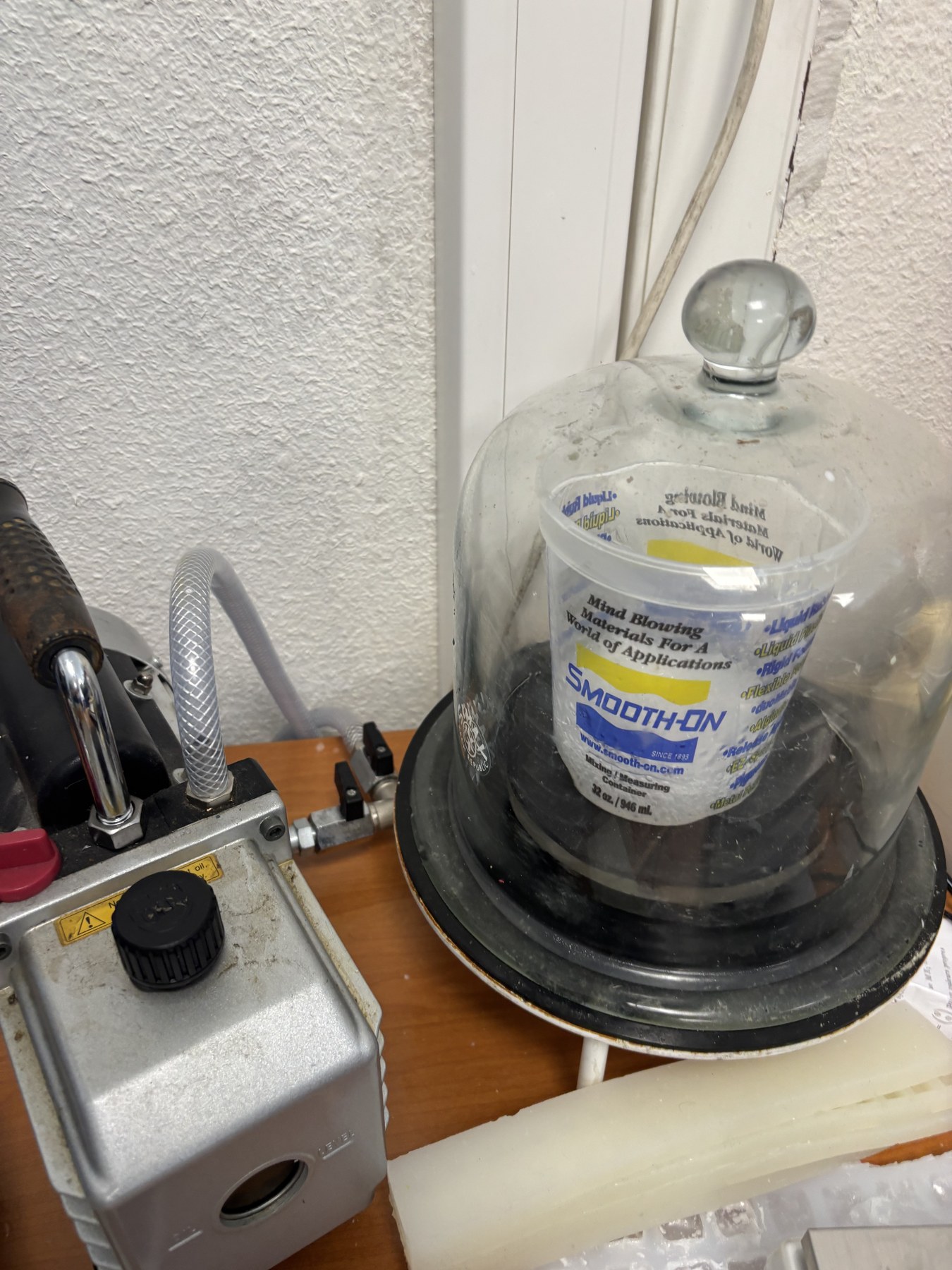 Vacuum degassing of silicone.
