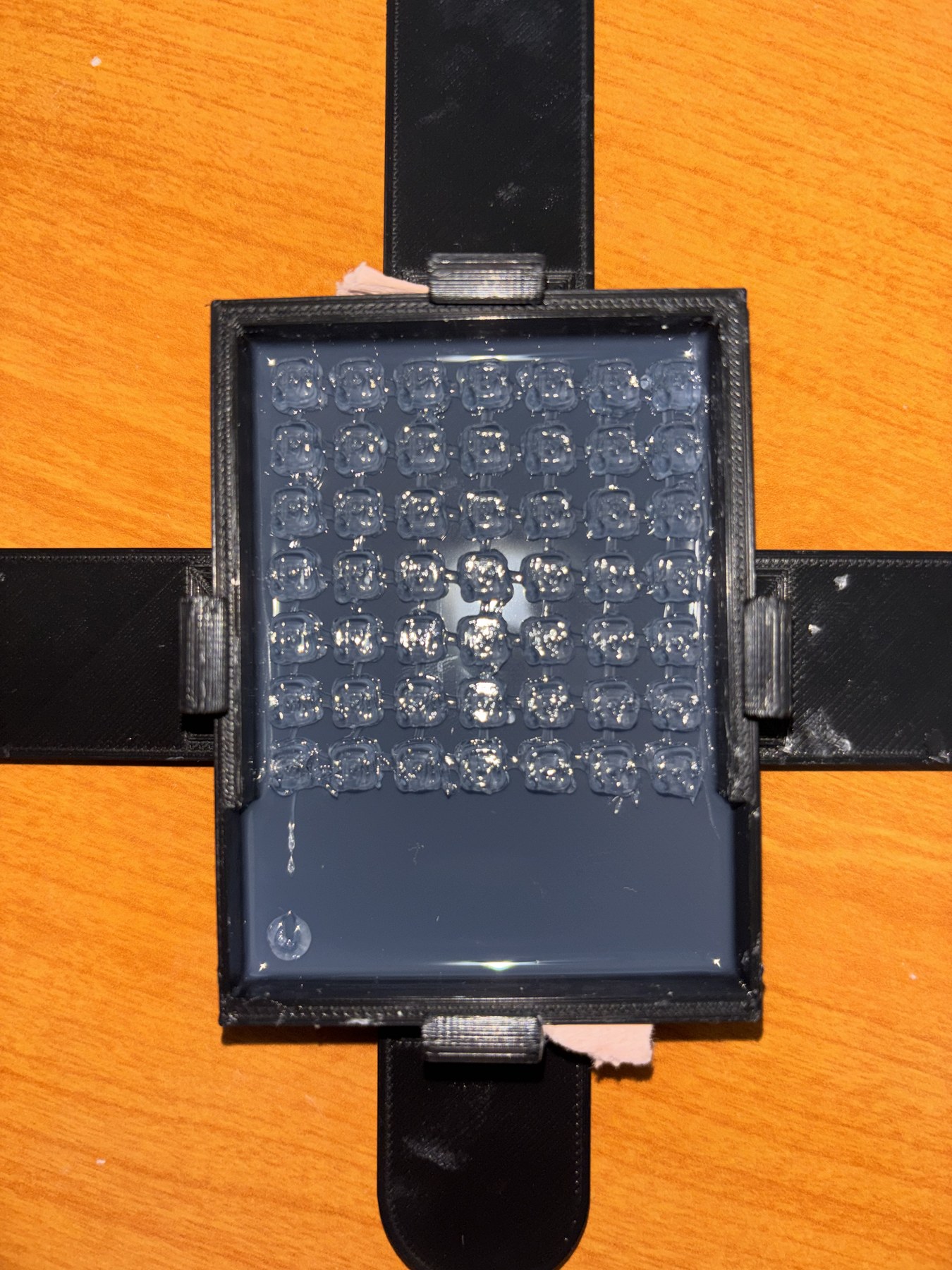 Hydrogel mold or soft actuator held in a frame.
